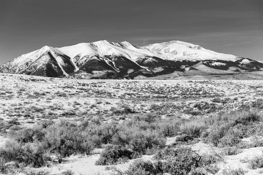 Black and White Rocky Mountains photography print of Mount Elbert overlooking a snowy landscape on a winter day in Colorado by Sean Ramsey of Southern Plains Photography.