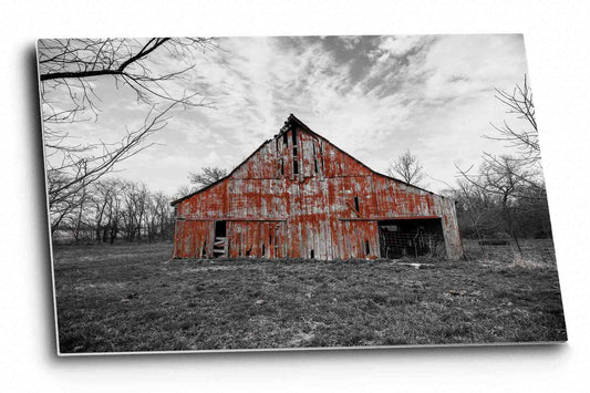 Country aluminum metal print of an old red barn with worn paint with a black and white landscape on an early spring day in Missouri by Sean Ramsey of Southern Plains Photography.
