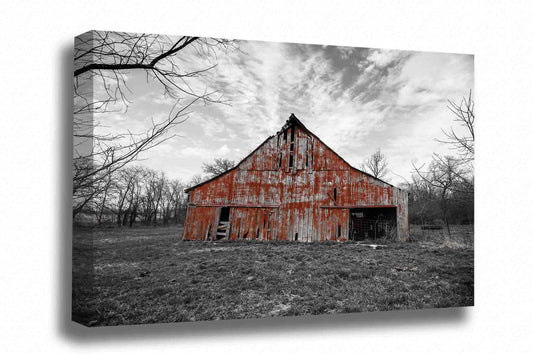 Country canvas wall art of a rustic red barn against a black and white landscape on an early spring day in Missouri by Sean Ramsey of Southern Plains Photography.