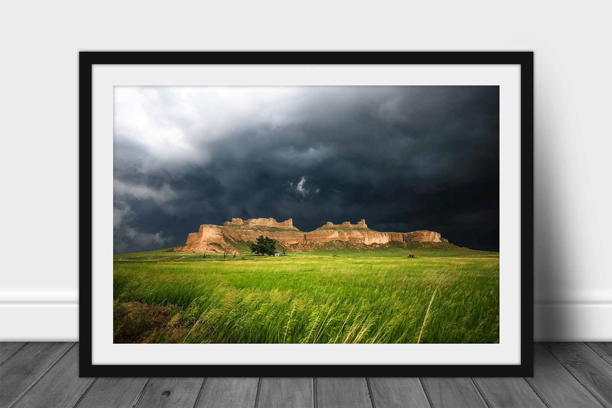 Framed and matted prairie print of a bluff under storm clouds on a stormy day along Wright's Gap Road in Nebraska by Sean Ramsey of Southern Plains Photography.