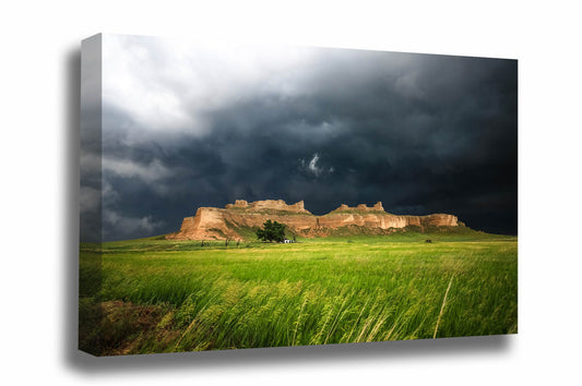 Great Plains canvas wall art of storm clouds over a bluff along Wright's Gap Road on a stormy spring day near Scottsbluff, Nebraska by Sean Ramsey of Southern Plains Photography.