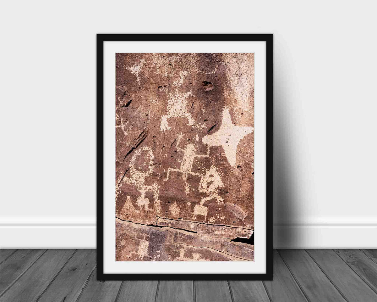 Vertical Southwestern framed print wall art of the ancient rock wall La Cieneguilla petroglyphs near Santa Fe, New Mexico by Sean Ramsey of Southern Plains Photography.