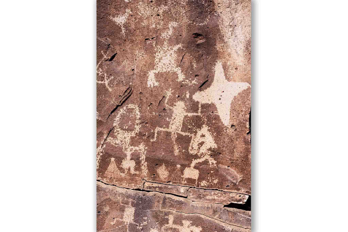 Vertical Southwestern photography print of the ancient rock wall La Cieneguilla petroglyphs near Santa Fe, New Mexico by Sean Ramsey of Southern Plains Photography.
