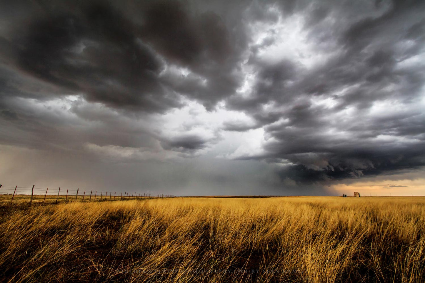 Storm photography print of a thunderstorm in silver sky over golden prairie grass on the Oklahoma prairie by Sean Ramsey of Southern Plains Photography.