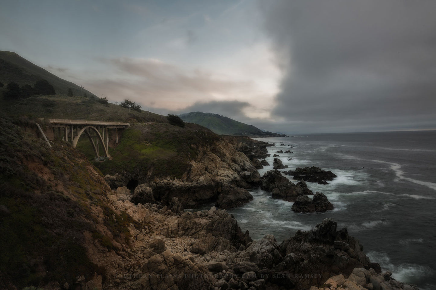Coastal photography print of fog rolling in to Bixby Bridge along Highway 1 on the Pacific Coast near Big Sur, California by Sean Ramsey of Southern Plains Photography.