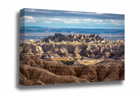 Landscape canvas wall art of spires rising above bluffs in the South Dakota Badlands by Sean Ramsey of Southern Plains Photography.