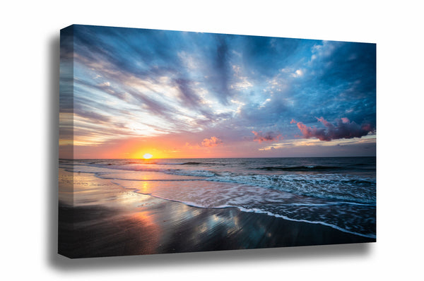 Coastal canvas wall art of a beautiful sunrise taking place as waves roll ashore on a beach at Hilton Head Island, South Carolina by Sean Ramsey of Southern Plains Photography.