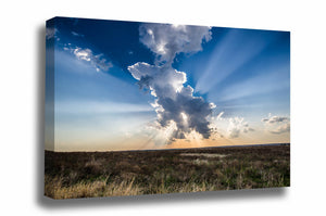 Canvas wall art of sunbeams bursting from behind a storm cloud on a spring day over the Kansas prairie by Sean Ramsey of Southern Plains Photography.