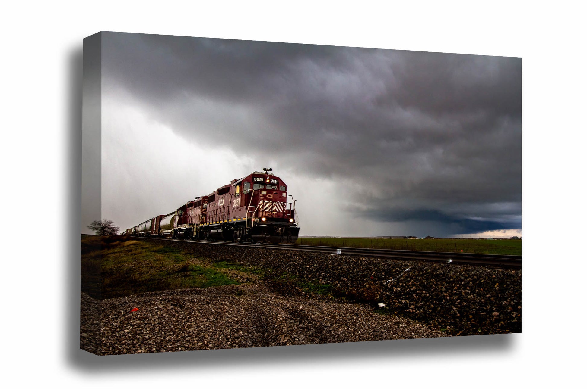 Railroad canvas wall art of a train emerging from a thunderstorm on a stormy winter day on the plains of Oklahoma by Sean Ramsey of Southern Plains Photography.
