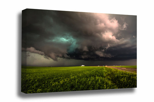 Storm canvas wall art of a twisting thunderstorm over a farmhouse on a stormy spring day on the plains of Colorado by Sean Ramsey of Southern Plains Photography.