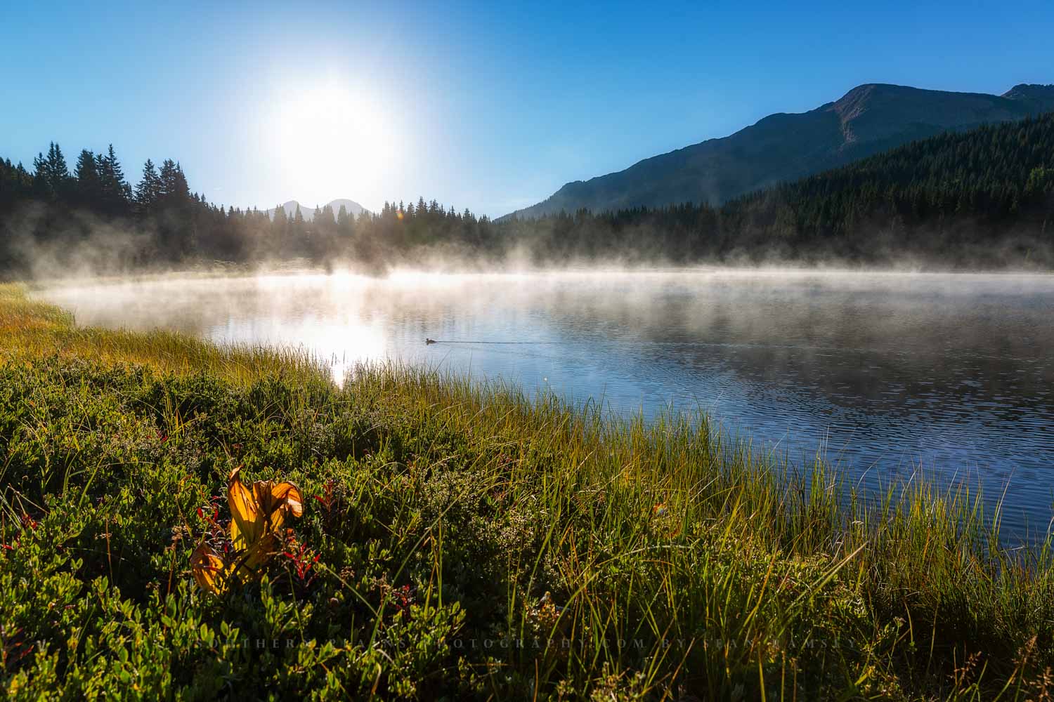 Rocky Mountains photography print of steam rising off the waters of Lake Andrews on a chilly autumn morning in the San Juan Mountains in Colorado by Sean Ramsey of Southern Plains Photography.