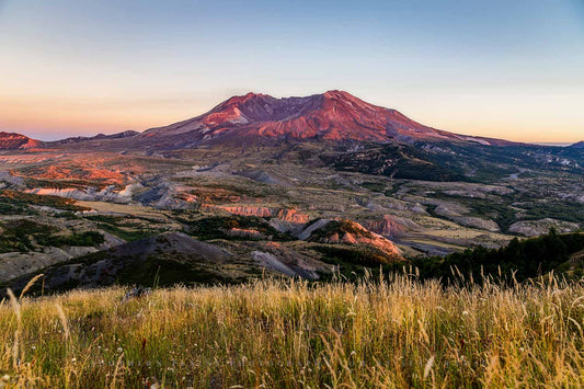 Mount St. Helens glows in evening light at sunset in Washington state.