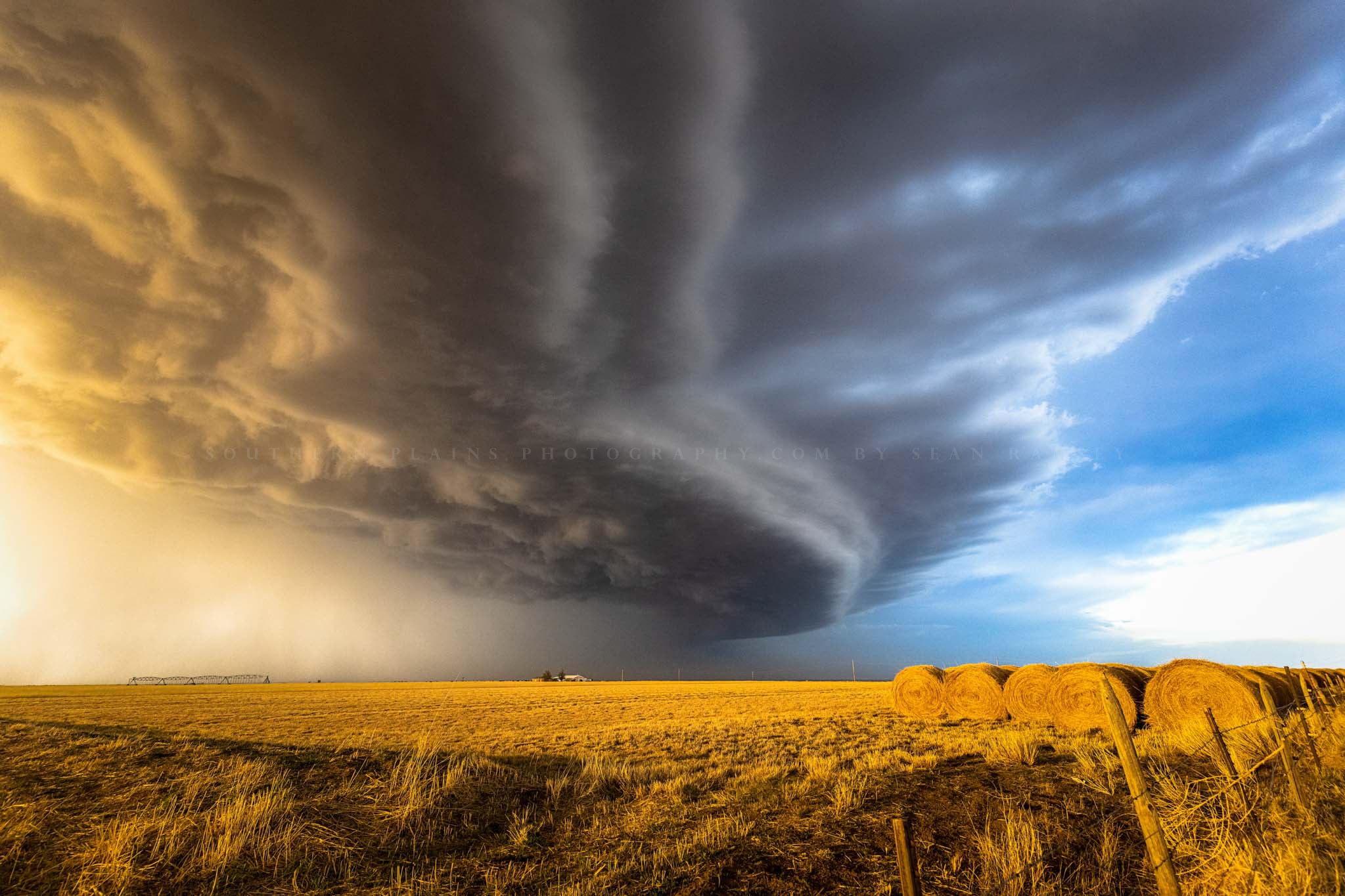 Great Plains photography print of a thunderstorm advancing over a farm on a stormy spring day in the Oklahoma Panhandle by Sean Ramsey of Southern Plains Photography.