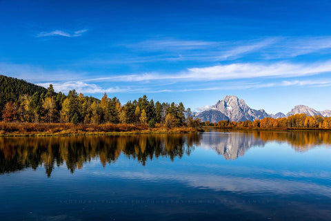 Rocky Mountain photography print of Mount Moran and an autumn landscape reflecting off the Snake River at Oxbow Bend in Grand Teton National Park, Wyoming by Sean Ramsey of Southern Plains Photography.