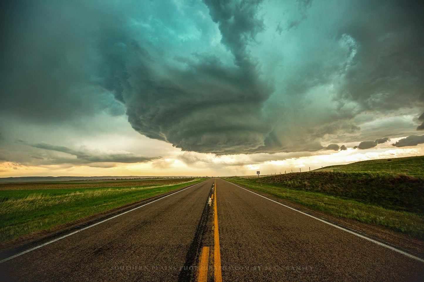 Storm photography print of a mesocyclone twisting over a highway on a stormy spring day in Nebraska by Sean Ramsey of Southern Plains Photography.