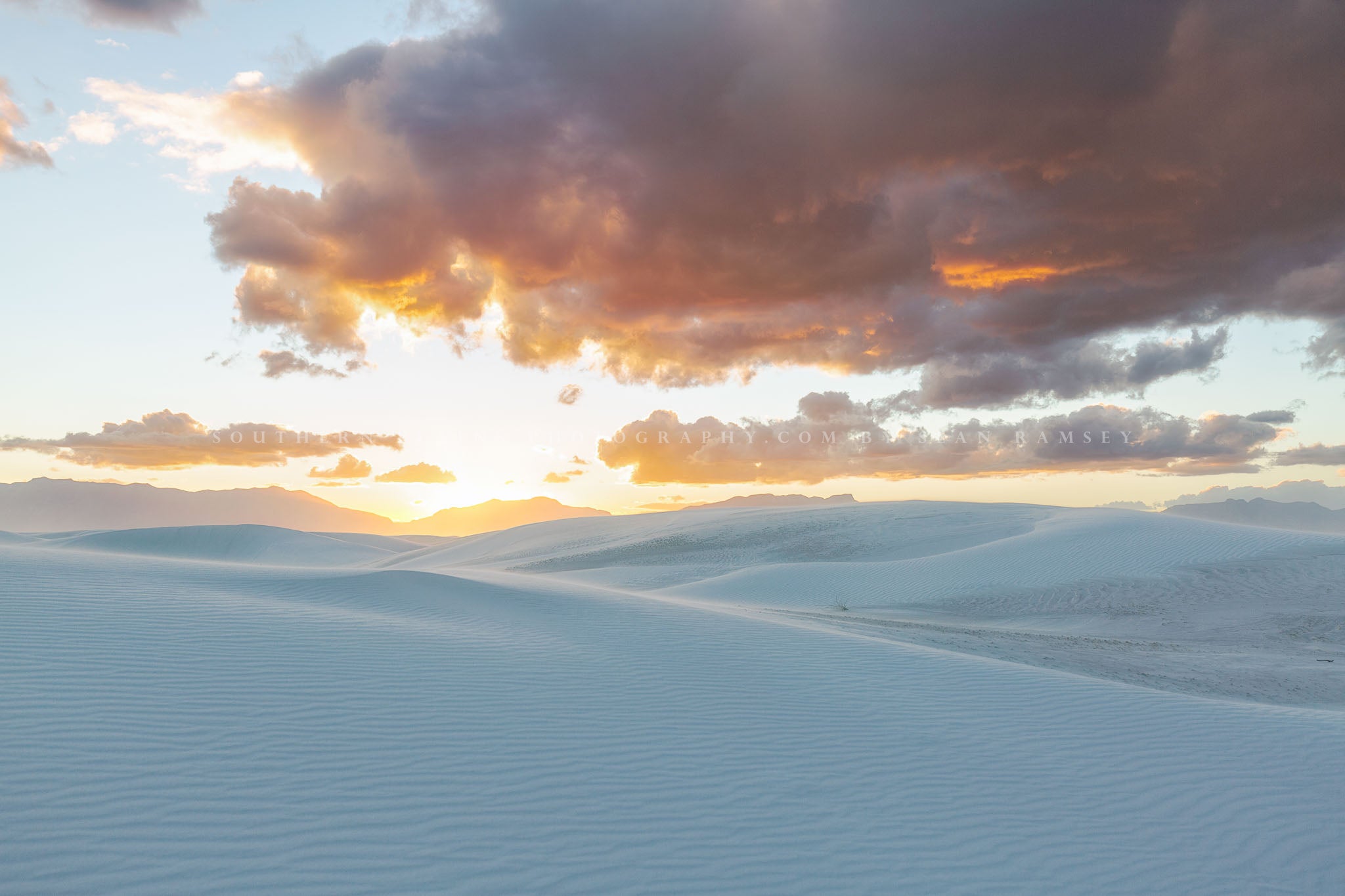 Desert photography print of a rose gold sunset taking place over dunes at White Sands National Park near Alamogordo, New Mexico by Sean Ramsey of Southern Plains Photography.