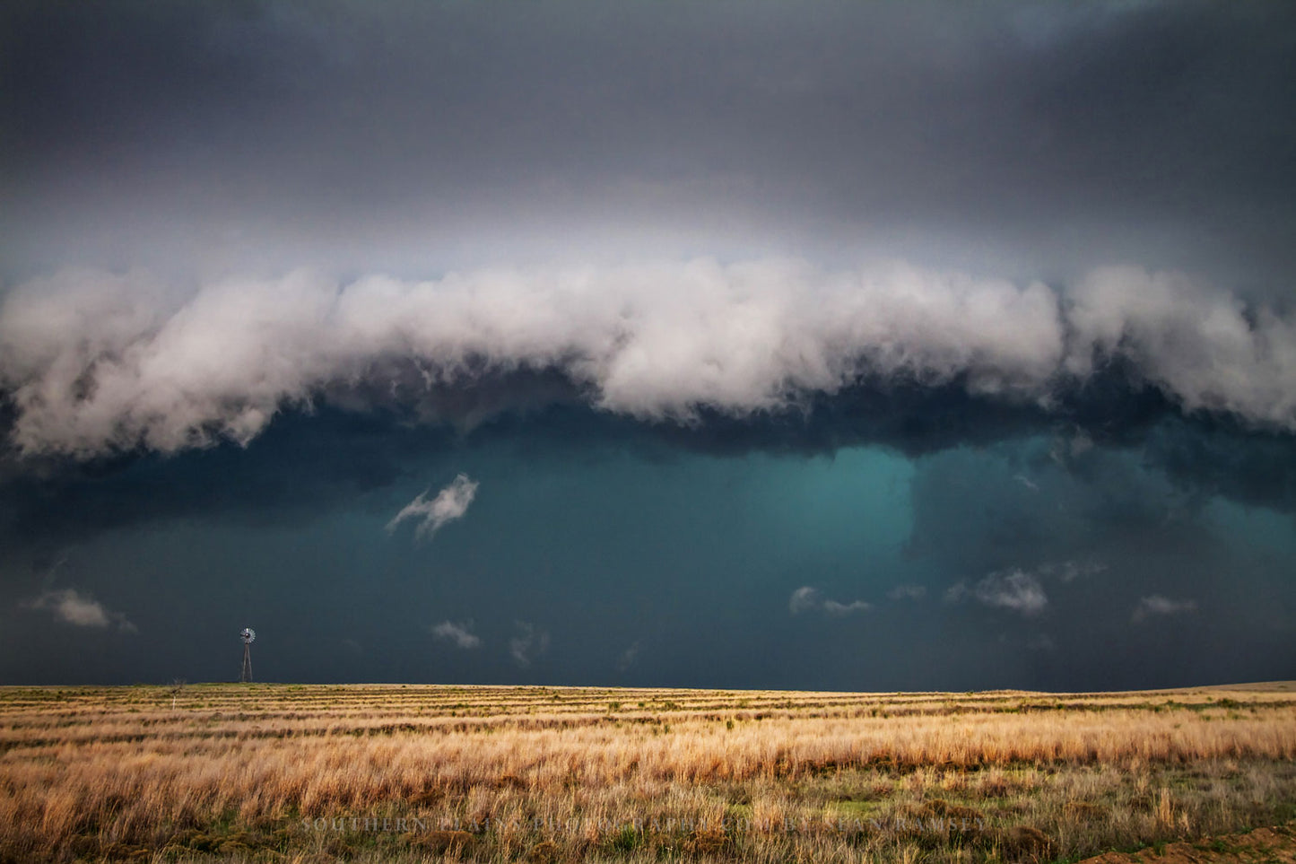 Storm photography print of a powerful thunderstorm engulfing a windmill on the plains of the Texas panhandle by Sean Ramsey of Southern Plains Photography.
