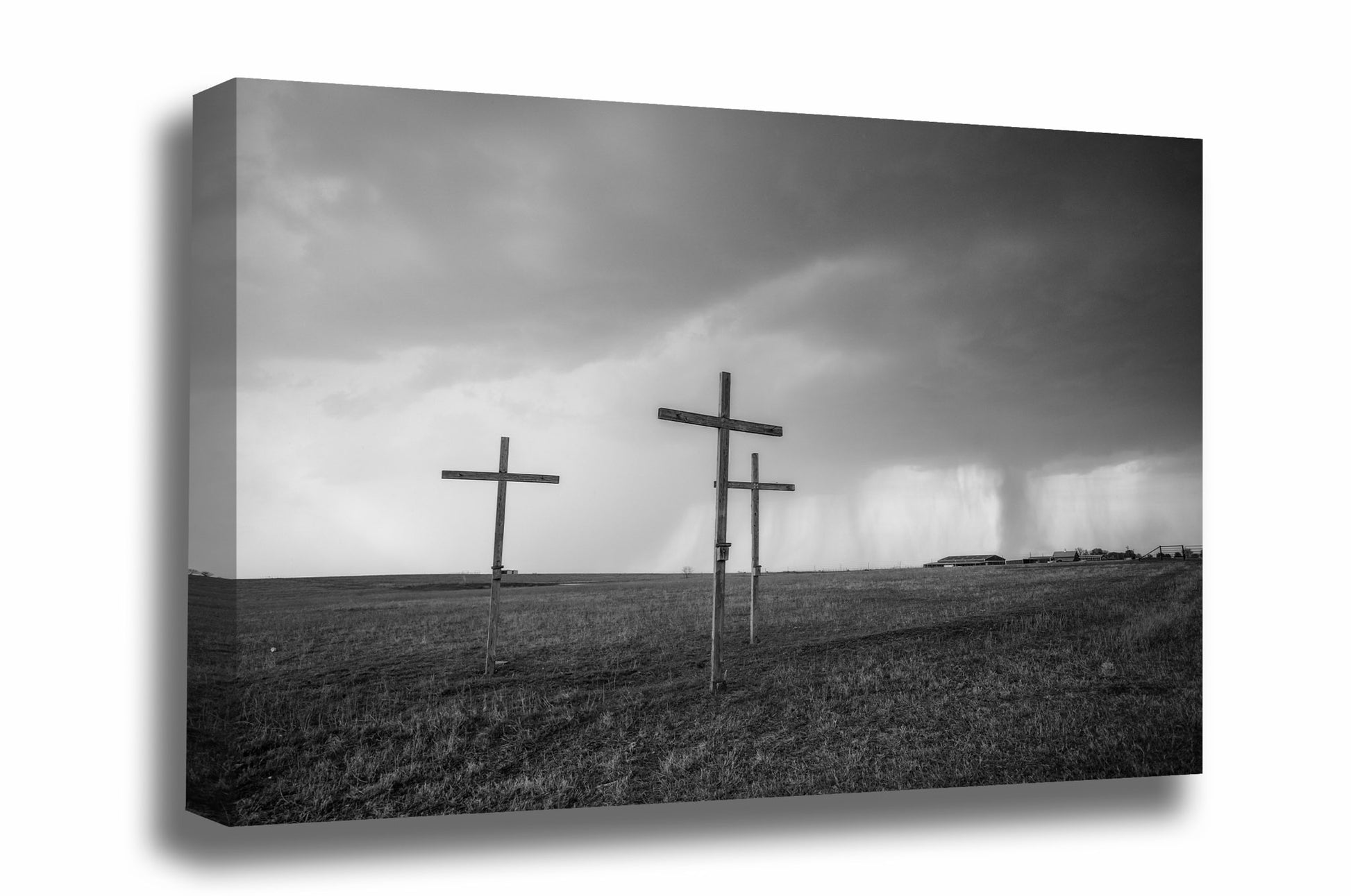 Black and white spiritual canvas wall art of three wooden crosses in a thunderstorm on Easter in Texas by Sean Ramsey of Southern Plains Photography.