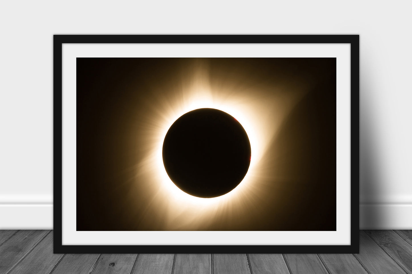 Framed and matted photography print of a total solar eclipse with gold corona captured in Nebraska by Sean Ramsey of Southern Plains Photography.