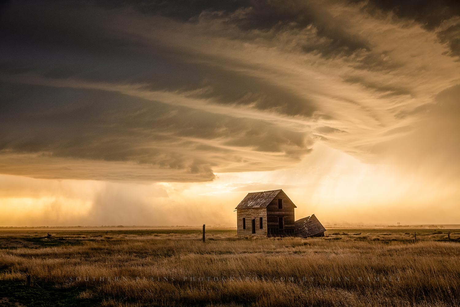 Storm photography print of a supercell thunderstorm over an old abandoned homestead on a stormy spring day on the plains of Colorado by Sean Ramsey of Southern Plains Photography.