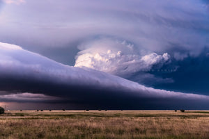 Storm photography print of a supercell thunderstorm spanning the horizon as the updraft climbs high into the sky on a stormy spring evening in Texas by Sean Ramsey of Southern Plains Photography.